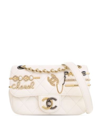 Mini sac à bandoulière Coco Clips Flap en peau d'agneau matelassée (2021-2024) - CHANEL Pre-Owned - Modalova