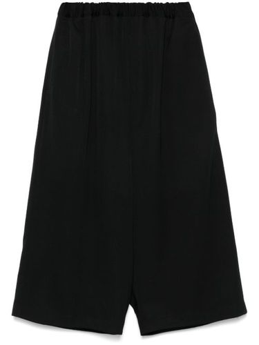 Pantalon à coupe sarouel - Comme Des Garçons Comme Des Garçons - Modalova