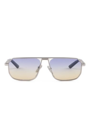 Lunettes de soleil à logo gravé - Prada Eyewear - Modalova