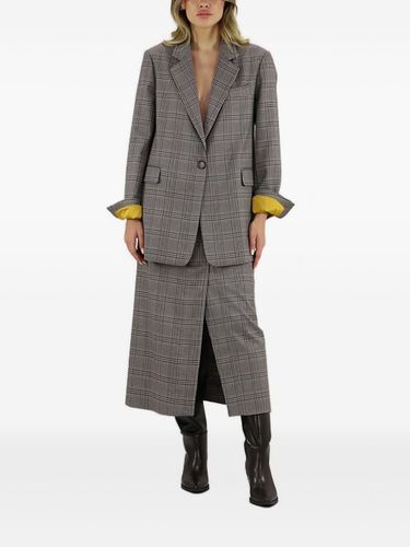 Jupe mi-longue à carreaux - Merci - Modalova