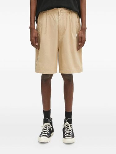 Short plissé à patch logo - AAPE BY *A BATHING APE® - Modalova