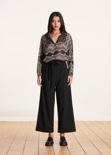 Pantalon large noir taille haute avec ceinture à nouer - La Fée Maraboutée - Modalova