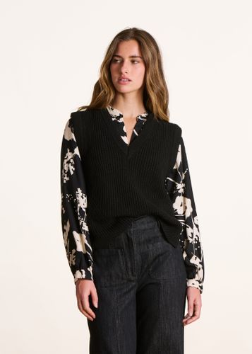 Pull noir sans manches col V - La Fée Maraboutée - Modalova