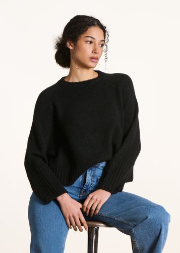 Pull cape noir en maille douce - La Fée Maraboutée - Modalova