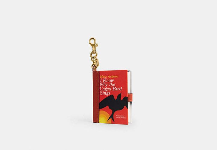 Breloque De Sac Livre Je Sais - COACH - Modalova
