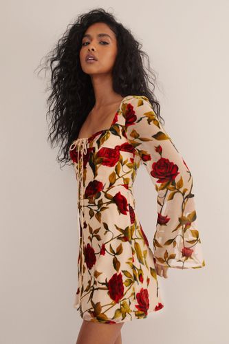 Devore Long Sleeve Lace Up Skater Mini Dress - 34 - Nasty Gal - Modalova