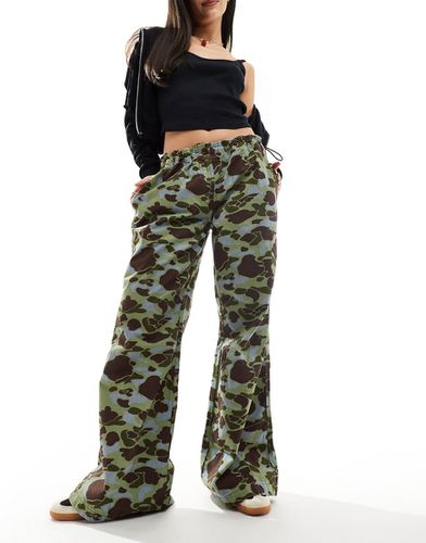 Pantalon camouflage taille basse - Collusion - Modalova