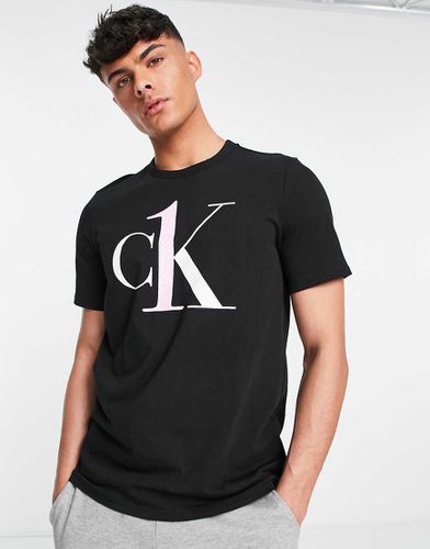 CK One - T-shirt confort à logo - Calvin Klein - Modalova