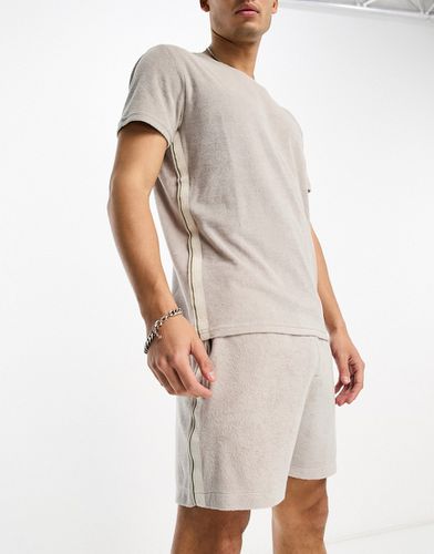 Core - T-shirt ras du cou d'ensemble en tissu éponge à bandes logo - Taupe français - Calvin Klein - Modalova