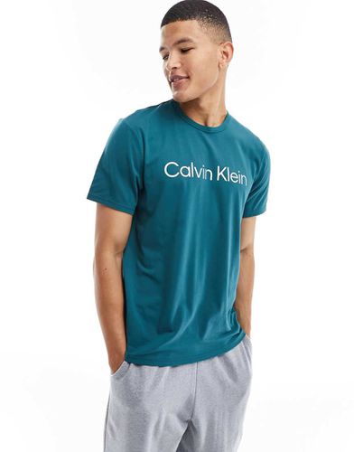 T-shirt confort avec logo sur la poitrine - Sarcelle - Calvin Klein - Modalova