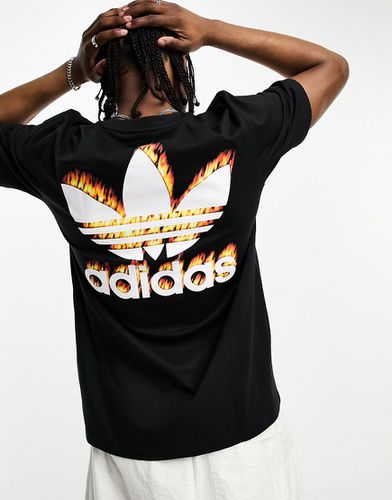T-shirt à logo trèfle enflammé - Adidas Originals - Modalova