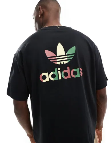 T-shirt style basketball à imprimé camouflage - Adidas Originals - Modalova