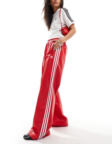 Firebird - Pantalon de survêtement en similicuir - Adidas Originals - Modalova