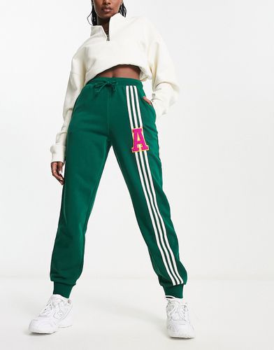 Pantalon de jogging à logo style universitaire - Adidas Originals - Modalova
