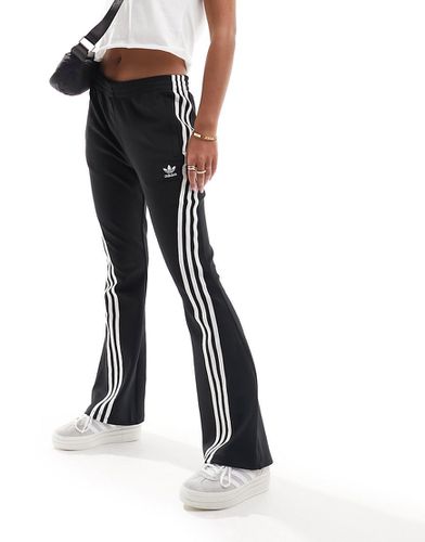 Pantalon de jogging évasé à trois bandes - Adidas Originals - Modalova