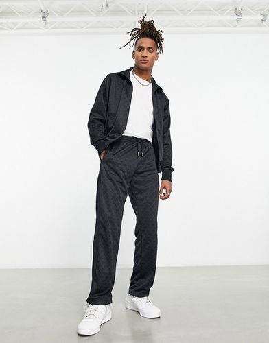 Adidas Originas - Pantalon de survêtement à monogramme et logo trèfle - Adidas Originals - Modalova