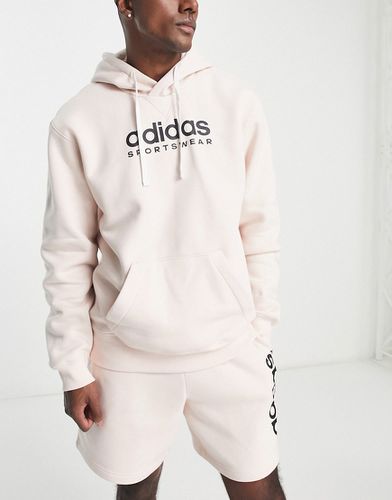 Adidas - Sportswear - Sweat à capuche avec logo linéaire - Blanc cassé - Adidas Performance - Modalova