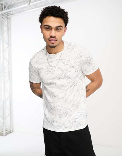 T-shirt avec imprimé aigle sur l'ensemble - Armani Exchange - Modalova