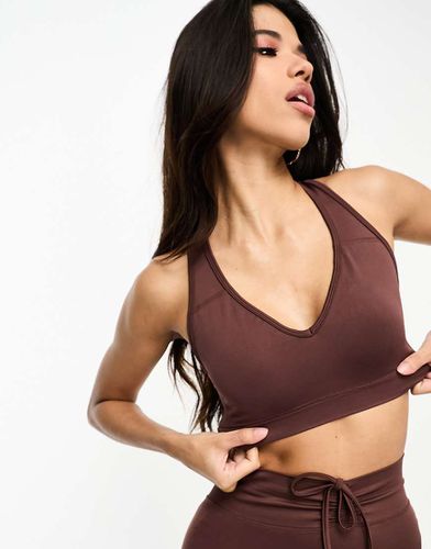 Brassière de sport d'ensemble maintien intermédiaire sans coutures - Asos 4505 - Modalova