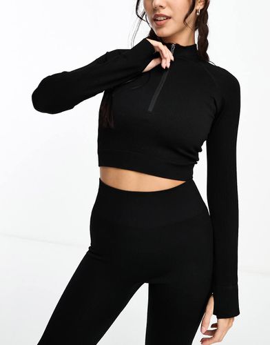 Icon - Top côtelé à col zippé et sans coutures à manches longues - Asos 4505 - Modalova