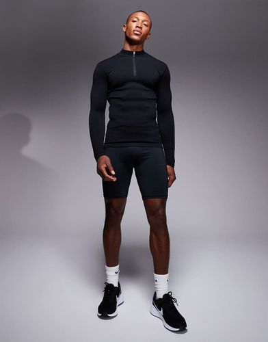 Icon - Top de sport moulant côtelé sans coutures à manches longues et col zippé - Asos 4505 - Modalova