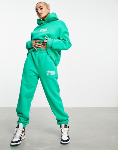 ASOS - Weekend Collective - Jogger d'ensemble avec logo ondulé - vif - ASOS Weekend Collective - Modalova