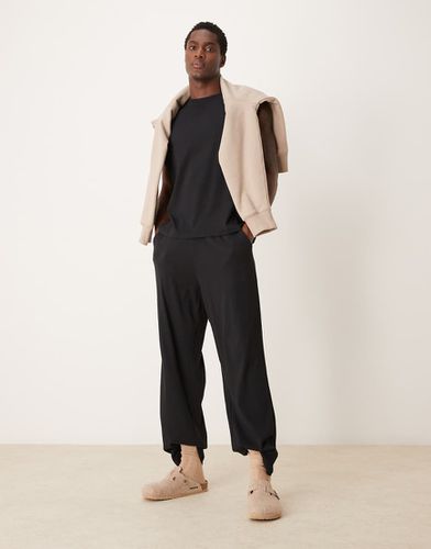 Capsule - Ensemble débardeur oversize et pantalon confort - Noir - Asos Design - Modalova