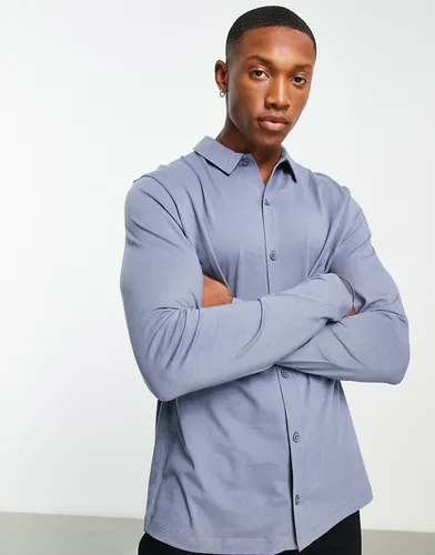 Chemise boutonnée à manches longues en jersey - Asos Design - Modalova
