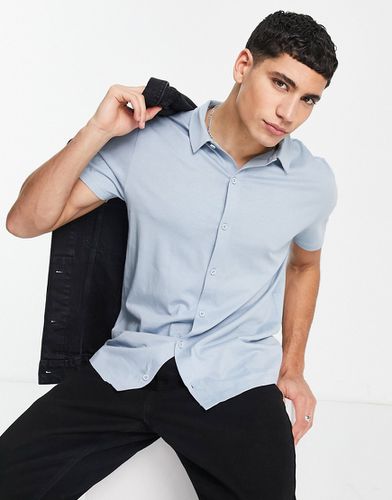 Chemise boutonnée en jersey - clair - Asos Design - Modalova