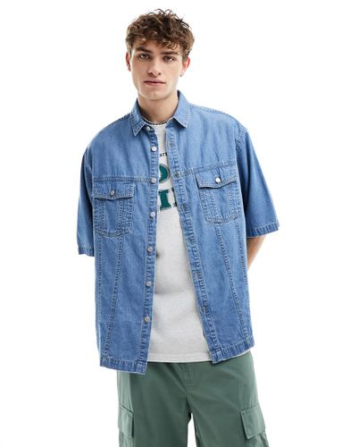Chemise en jean oversize coupe carrée à manches courtes - délavé - Asos Design - Modalova