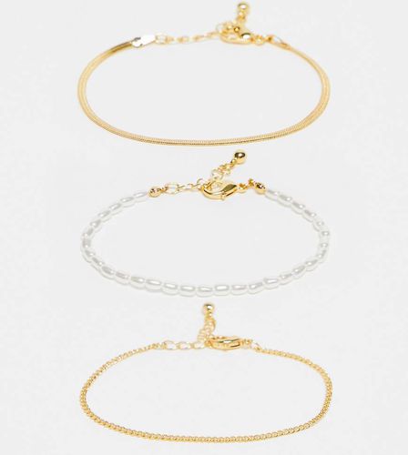 ASOS DESIGN Curve - Lot de 3 bracelets chaîne en plaqué or 14 carats à perle fantaisie - Asos Curve - Modalova