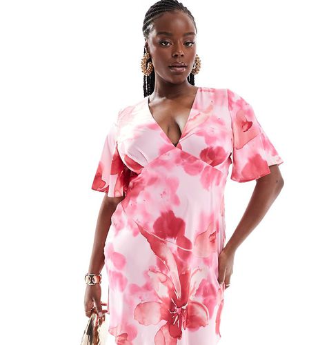 ASOS DESIGN Curve - Robe courte en satin imprimé fleuri à manches évasées - Rose - Asos Curve - Modalova