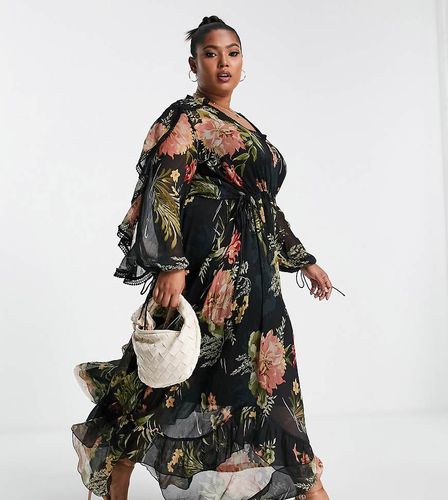 ASOS DESIGN Curve - Robe longue drapée à volants avec empiècements en dentelle et pampilles - Noir fleuri - Asos Curve - Modalova