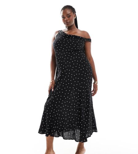 ASOS DESIGN Curve - Robe nuisette mi-longue asymétrique à pois avec bretelle - Noir et blanc - Asos Curve - Modalova