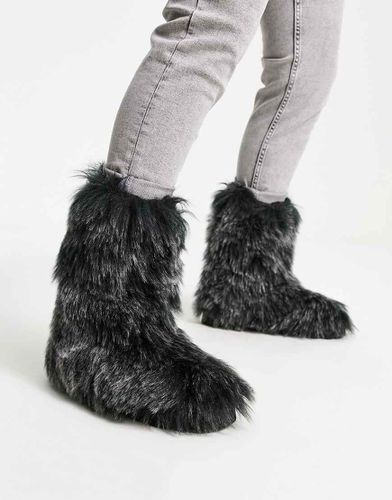 Bottes mi-mollet en fausse fourrure - Asos Design - Modalova