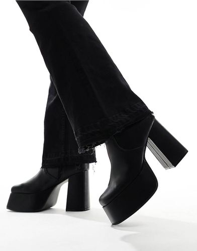 Bottes montantes à talon et semelle plateforme en similicuir - Asos Design - Modalova