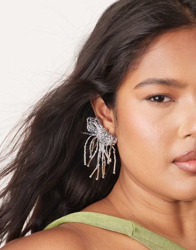 Boucles d'oreilles avec naud en perles - Asos Design - Modalova