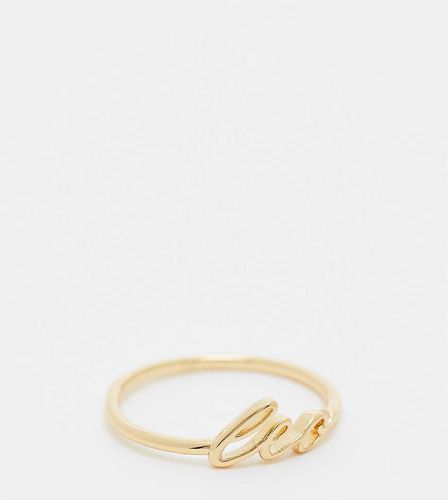 Bague en plaqué or 14 carats avec signe astrologique Lion et pochette cadeau - Asos Design - Modalova