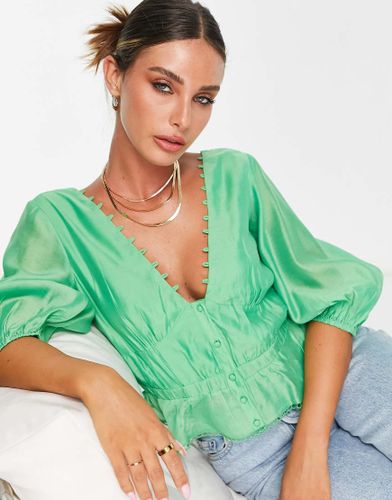 Blouse boutonnée à taille élastique et ourlet à basque - Asos Design - Modalova
