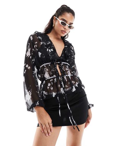 Blouse en mousseline à fleurs avec volants et liens noués - Noir et blanc - Asos Design - Modalova