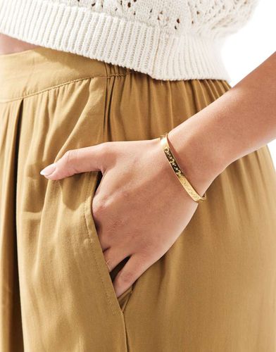 Bracelet jonc en acier inoxydable imperméable à détails célestes gravés - Asos Design - Modalova