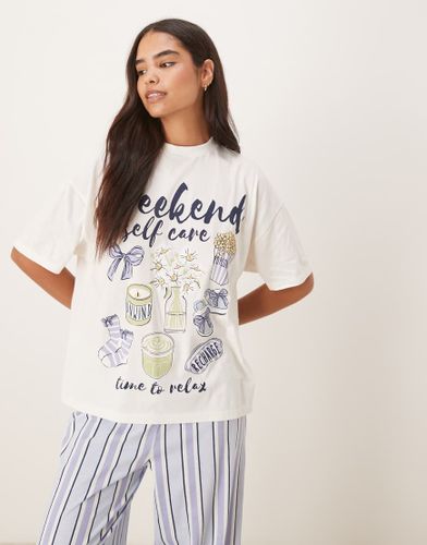 Ensemble de pyjama avec pantalon ample et t-shirt oversize  inscription Weekend Self Care  - Asos Design - Modalova