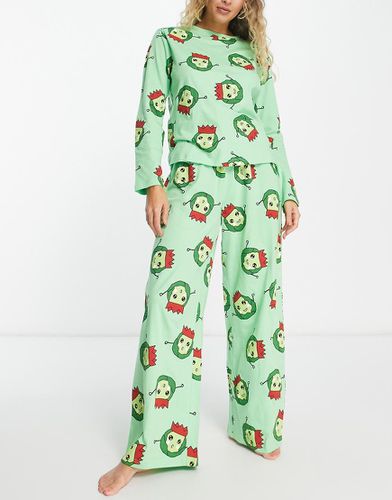 Ensemble de pyjama de Noël avec pantalon et top manches longues à motif choux de Bruxelles - Asos Design - Modalova