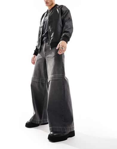 Jean ultra ample zippé aux genoux - délavé - Asos Design - Modalova