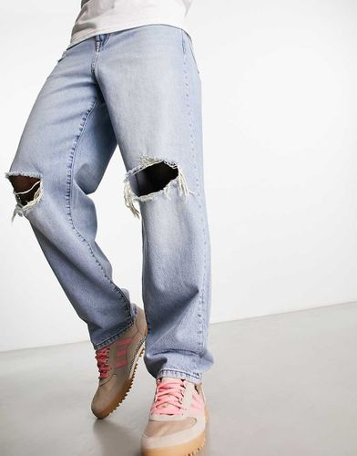 Jean baggy déchiré aux genoux - clair délavé - Asos Design - Modalova