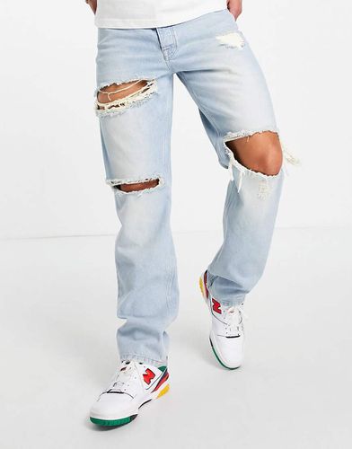 Jean droit ample délavé style années 90 avec déchirures - Asos Design - Modalova