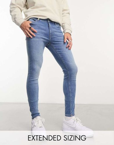 Jean en tissu power stretch - Délavage moyen - Asos Design - Modalova