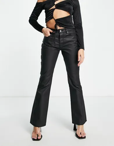 Jean enduit taille basse évasé - Asos Design - Modalova