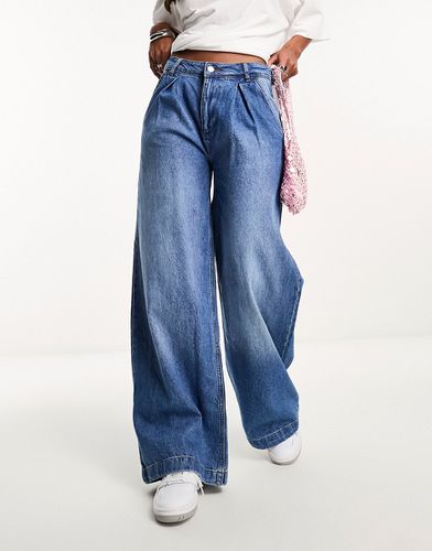 Jean large plissé - moyen - Asos Design - Modalova