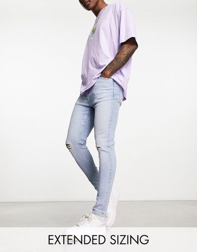 Jean seconde peau en tissu power stretch déchiré aux genoux - clair délavé - Asos Design - Modalova